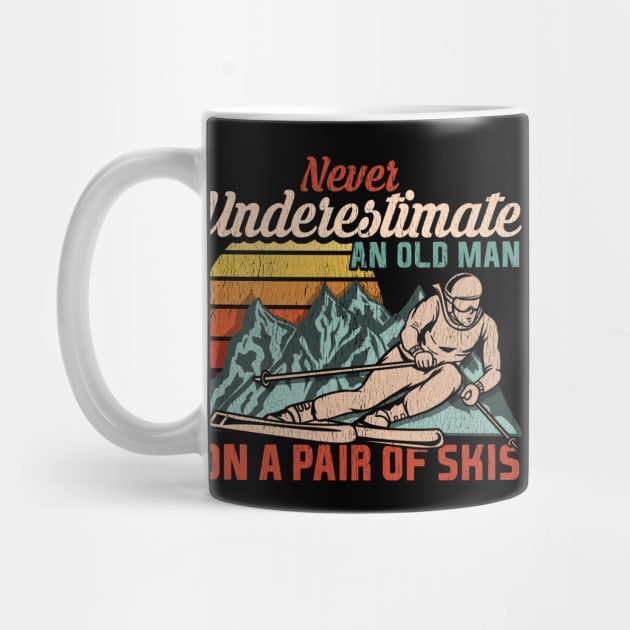 Mens Never Underestimate an Old Man on a Pair of Skies I Skiing graphic by biNutz